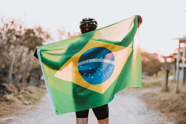 istock cyclist with brazil flag 1266312720