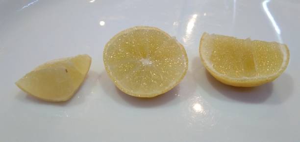 istock White Plate Different cutting size of lemon. 1266313479