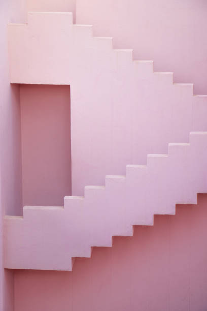istock Beautiful stairs in a pink facade 1266314860