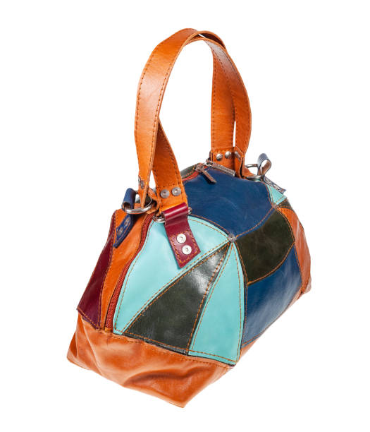 istock handmade patchwork leather travel bag isolated 1266315233