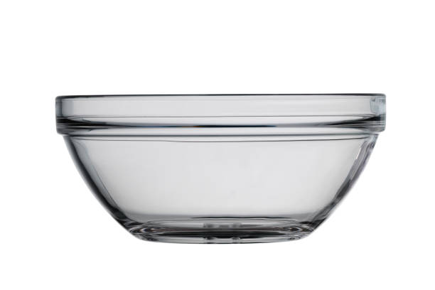 istock Empty glass salad bowl, round shape. Isolated on a white background 1266316391