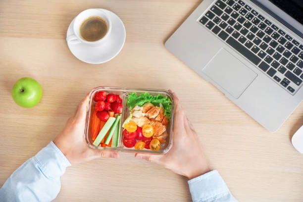 istock Healthy lunch at office workplace 1266316638