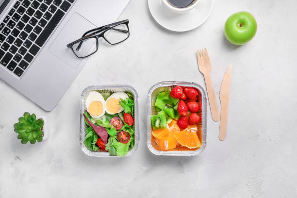istock Healthy lunch at office workplace 1266317295