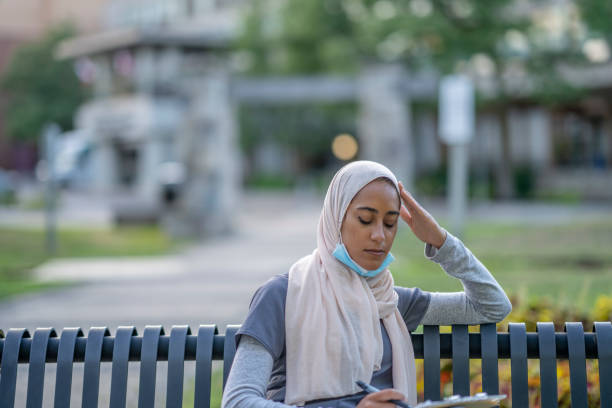 istock Muslim Medical Professional on Break 1266322835