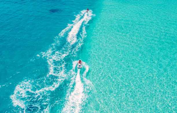 Aerial view Jet Ski Indian Ocean Maldives island travel holiday concept.
