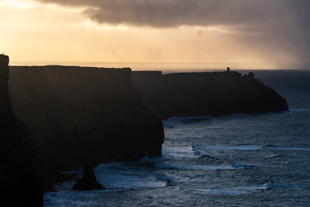 istock Cliffs of Moher at sunset in Ireland 1266325017