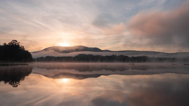 istock Sunrise on Powder Mill Pond, Bennington New Hampshire 1266328575
