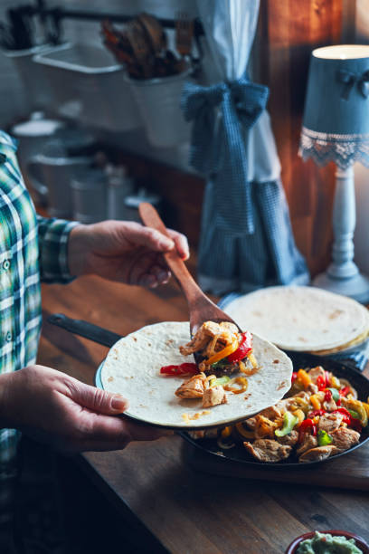 istock Fajitas de Pollo Chicken marinated Tortillas with Onions and Peppers 1266334801