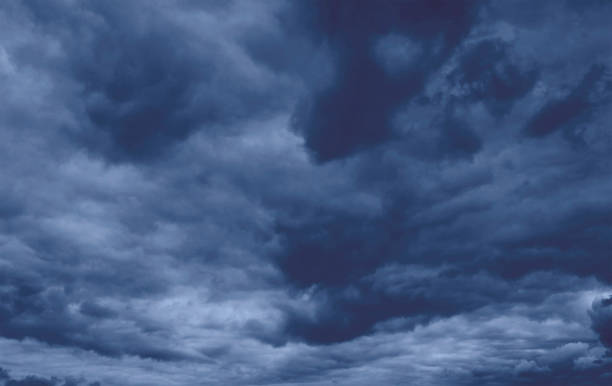 istock Ominous dark clouds, gloomy sky 1266336735