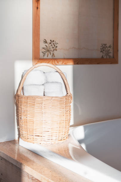istock White towels on bathtub in hotel bathroom 1266338616