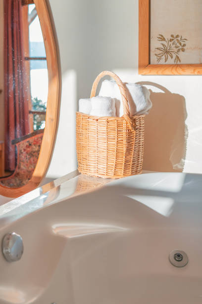 istock White towels on bathtub in hotel bathroom 1266338794