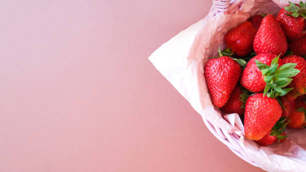 istock Bowl of red ripe strawberries. 1266338898