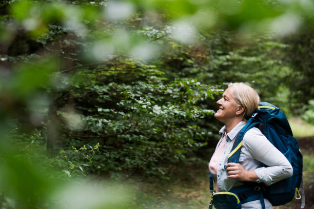 istock Senior woman hiking 1266342597