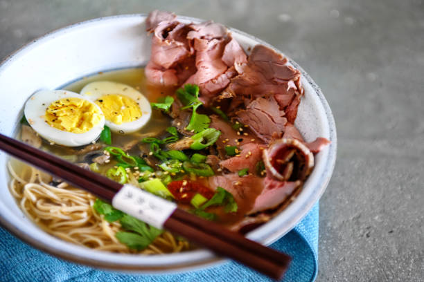 Bowl of ramen with beef, noodles, vegetables and eggs, Quebec, Canada