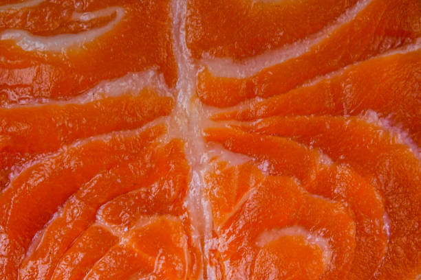 Texture of salmon fish fillet for the background