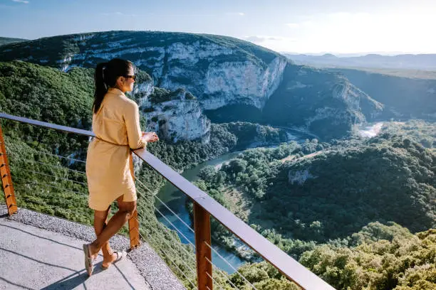 woman on vacation in the Ardeche France Pont d Arc, Ardeche France,view of Narural arch in Vallon Pont D'arc in Ardeche canyon in France Europe