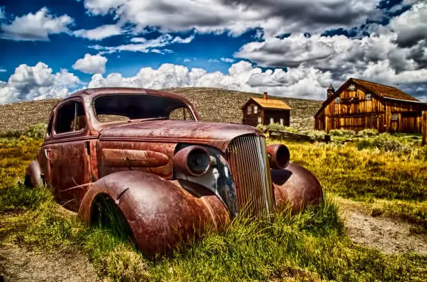 I found an abandoned 1937 Chevrolet Coupe in the desert. The days of sitting in the harsh desert sun and rain have taken its toll on what was a fine automobile.