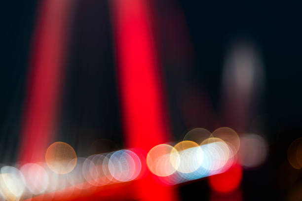 Bokeh with defocused of Yavuz Sultan Selim Bridge in Istanbul, Turkey Bokeh with defocused of Yavuz Sultan Selim Bridge in Istanbul, Turkey red light stock pictures, royalty-free photos & images