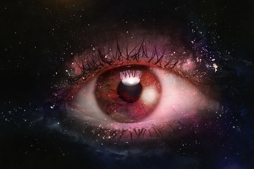 Giant eyeball starscape backdrop with colorful space clouds