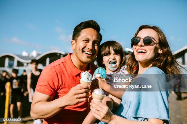 Family Eating Ice Cream At California Pier Stock Photo - Download Image Now - Ice Cream, Family, Multiracial Group