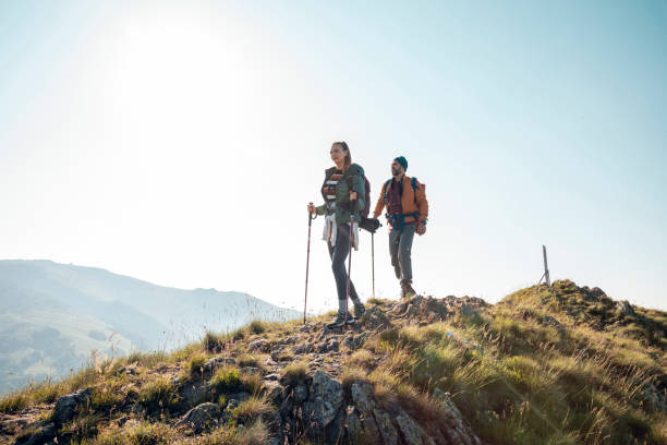 Close up of a young couple hiking in the mountains together