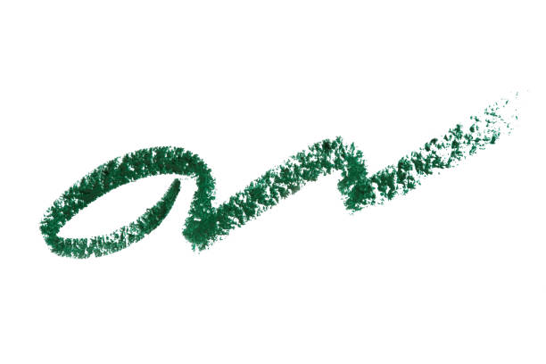 istock Eyeliner swatch stroke isolated on white background. Eye pencil green color texture sample. 1266382502