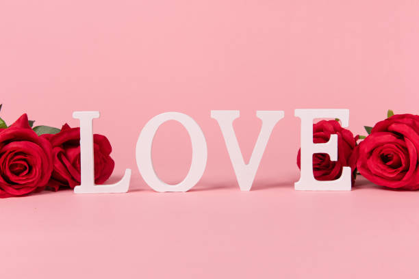 istock love letters and rose on pink background, Valentine's Day 1266383661