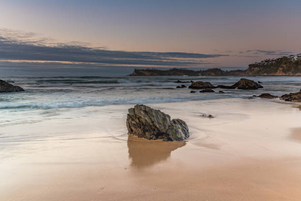 istock Sunrise seascape and low cloud bank 1266384634