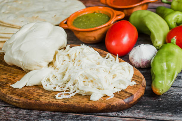 Oaxaca Chesse or queso oaxaca or quesillo is a Mexican fresh white Chesse from Mexico Oaxaca Chesse or queso oaxaca or quesillo is a Mexican fresh white Chesse from Mexico oaxaca city photos stock pictures, royalty-free photos & images