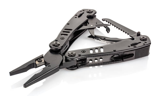 istock Close-up view of lying EDC folding knife with open tools isolated on white background 1266391490