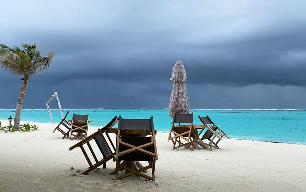 istock umbrella sun and chair 1266392496
