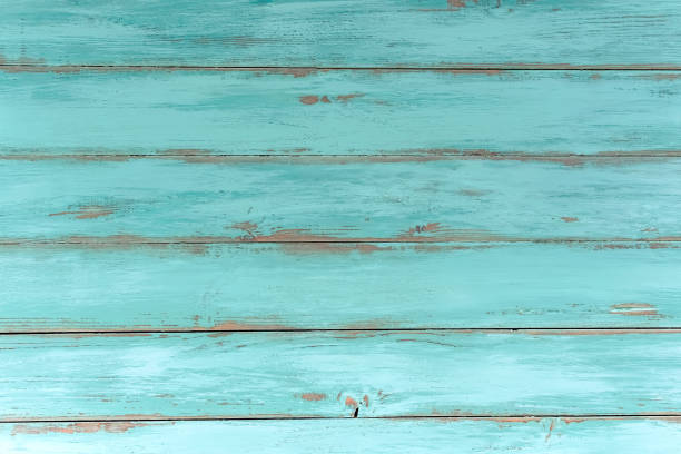 istock Wood rustic light blue or green background. Old wooden table, top view. 1266397193