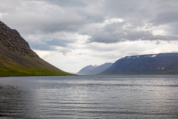 Calm water in a fjord in a remote part of Iceland, called the West Fjords