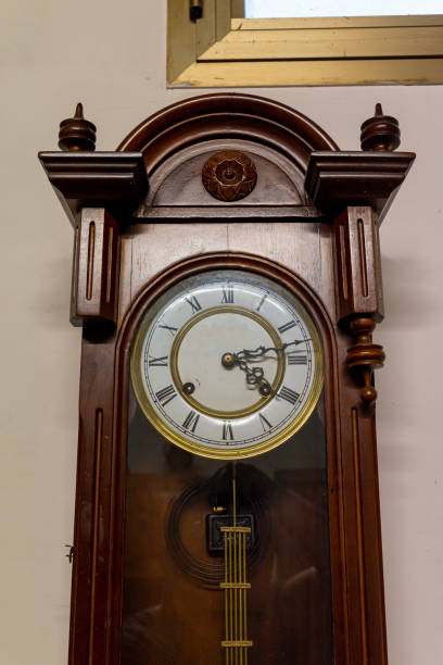 istock antique pendulum clock in inlaid wood 1266405790