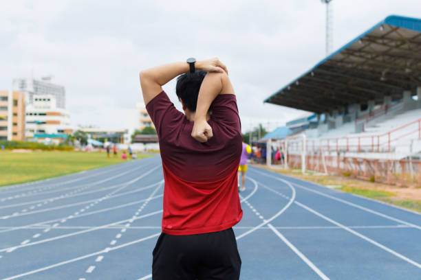 istock Young man warm up before running. exercise concept. Warm up concept. workout concept 1266408426