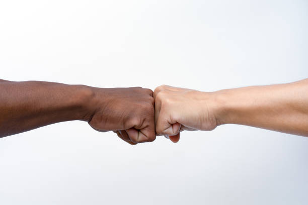istock Man giving fist bump isolated on white background with clipping path. 1266408722