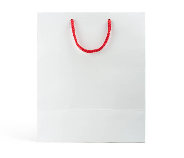 Mock-up of blank shopping bag with red handle rope on white background stock photo