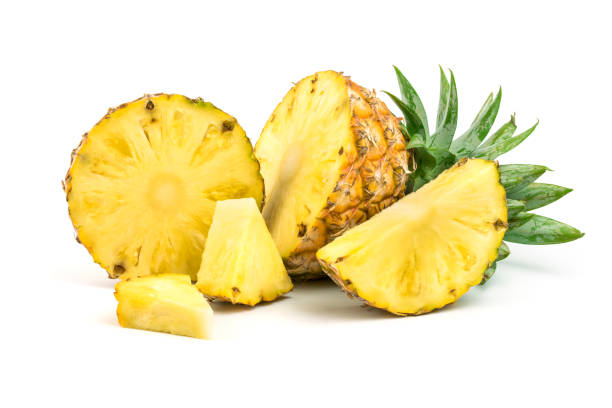 istock Pineapple with slices isolated on white background. 1266408820