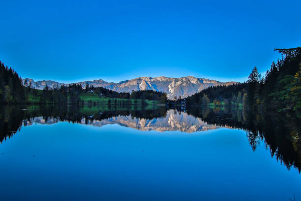 istock Mountain lake perfect reflection, Gleinkersee, Austria 1266409800
