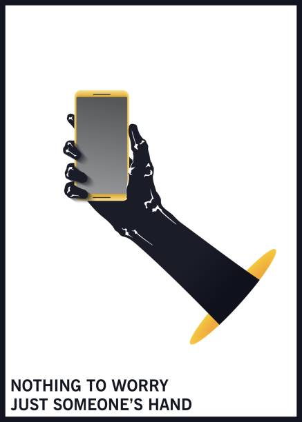 istock The hand is holding a mobile phone. Symbol of hacking of personal data. Black and white minimal illustration. Vector template 1266412289