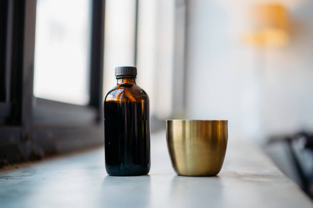 istock Cold brew coffee in glass bottle and a metal cup 1266412848