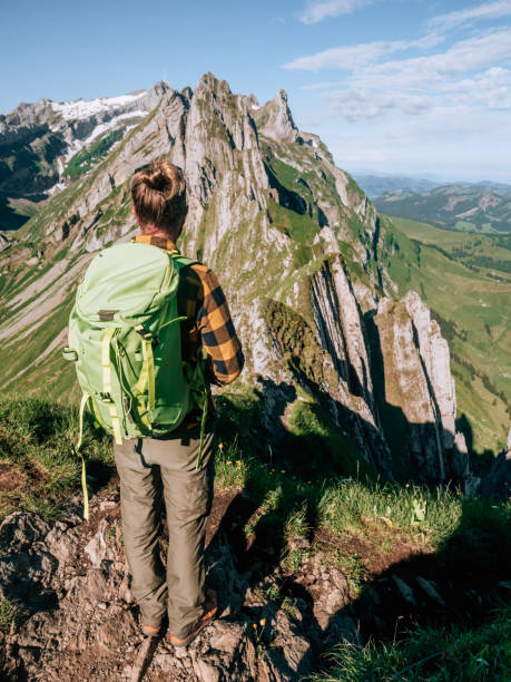 istock Man hikes in the Swiss Alps 1266418866