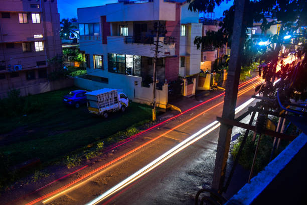 istock Light trail of moving vehicles 1266422417