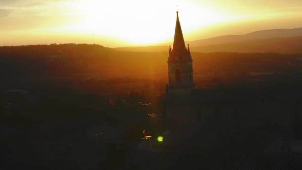 Church in Bonnieux, France basking in the last golden light
