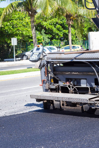 istock Pavement truck laying fresh asphalt 1266433795