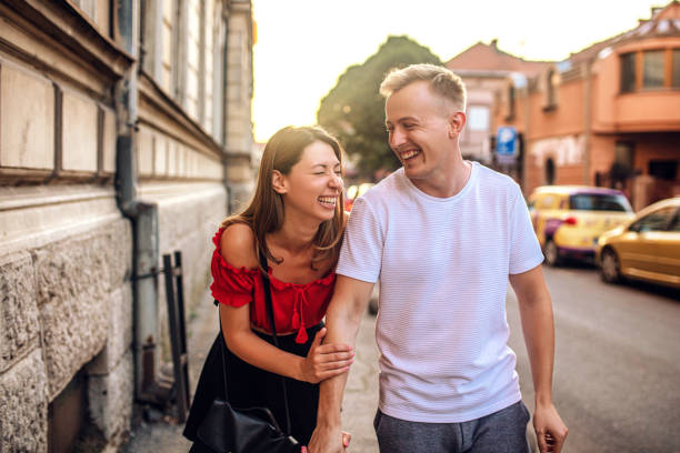 istock Beautiful young couple smiling at the park 1266436306