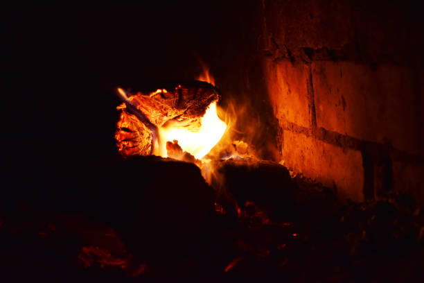 istock A burning fireplace in a country house. A soft fire for a cozy evening. Warm light 1266438943