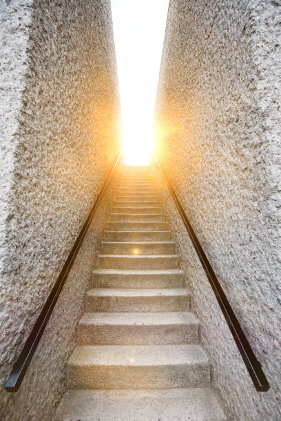 istock Light at the end of the stairs 1266440113