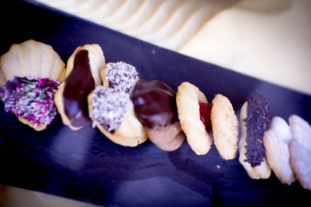 istock Assorted pastries and sweets placed in a bakery display. No people 1266440212