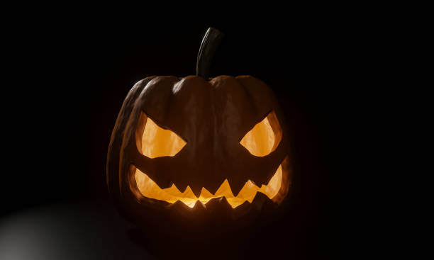 istock Halloween Pumpkin. The demon's face had light from inside. The black background and the light shining from the back. 3D Rendering 1266441366